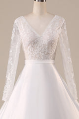 Ivory A Line Tulle Backless Wedding Dress with Long Sleeves V-neck