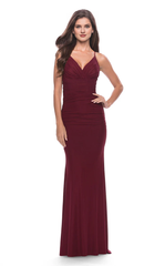 Thin shoulder strap deep V-neckline sleeveless backless side slit and floor length evening dress