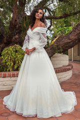 V-neckline slim fit waistline long sleeved and floor length wedding dress