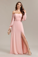 Pink A-line slit off shoulder long wedding guest dress