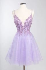 Embroidered short sleeveless dress paired with A-line skirt