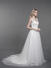 Lace wedding dress with drag and shoulder straps