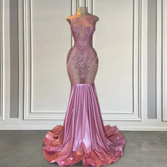 Lange roze mouwloze zeemeermin prom -jurk met kralen