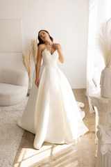 Pleated strapless satin and floor length wedding dress