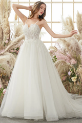 Ivory thin shoulder strap sheer and floor length wedding dress
