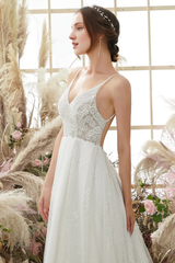 V-neck sleeveless thin shoulder strap and floor length wedding dress