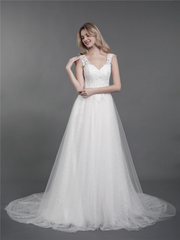 Lace wedding dress with drag and shoulder straps
