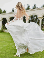 Deep V-neck buttoned church trailing bridal gown
