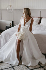 A Line Deep V Neck Slit Wedding Dress with Bowknot