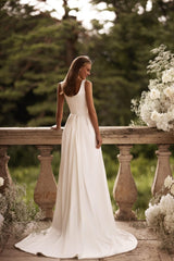 Elegant Ivory Satin Wedding Dress with Square Neck Accentuated Waist and Extended Train
