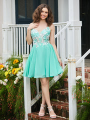 Appliqued Plunging V-Neck Pleated Mini Dress Spa