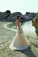 Long A-line sheer sleeveless lace wedding dress