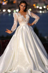 Unique long sleeved V-neck satin lace bridal gown