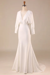 Minimalist ivory fishtail long sleeved backless deep V-neck wedding dress