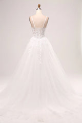 Ivory A-line thin shoulder strap tight fitting corset lace sheer long wedding dress