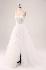 Ivory A-line thin shoulder strap tight fitting corset lace sheer long wedding dress