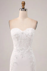 Ivory strapless off shoulder fishtail off back wedding dress