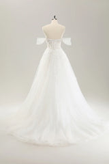 Princess style off the shoulder sweeping with decals and trailing lines