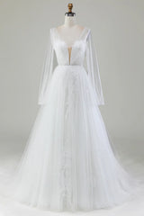 Ivory A-line V-neck long sleeved pleated sheer wedding dress