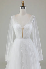 Ivory A-line V-neck long sleeved pleated sheer wedding dress