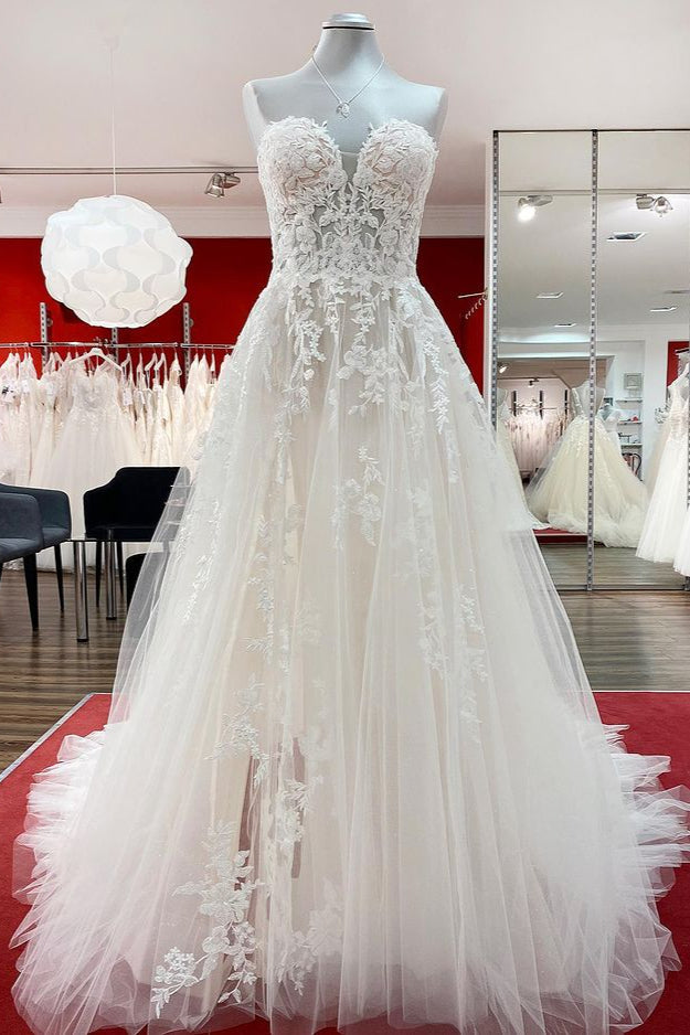 Mooie lange A-lijn strapless tule ivoor trouwjurk met appliques kant