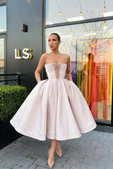 Chic and Flirty Strapless A-Line Prom Dress with Convenient Pockets