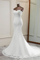 Chique lange zeemeermin strapless kanten appliques trouwjurk