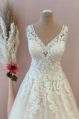 Stijlvolle lange a-line sweetheart appliques kant tule backless trouwjurk