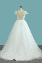 Elegant Floor-length Bateau Wedding Dress with Backless Lace and Tulle Appliques in an A-Line Silhouette