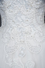 Elegant Long Sleeve Ball Gown Wedding Dress with Lace Appliques