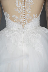 Elegant Long Sleeve Ball Gown Wedding Dress with Lace Appliques