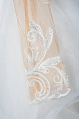 Elegant Long Sleeve Ball Gown Wedding Dress with Lace Appliques