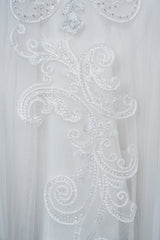 Elegant Long Sleeve Ball Gown Wedding Dress with Lace Appliques