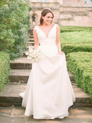 Ivory A-Line Wedding Dresses With Train Sleeveless Pockets V-Neck Backless Satin Fabric Long Bridal Gowns