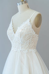 Lange A-Line spaghetti-riem kanten tule tule backless trouwjurk