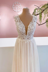 Lange a-line lieverd tule backless trouwjurk met bloemenkant