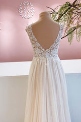 Lange a-line lieverd tule backless trouwjurk met bloemenkant