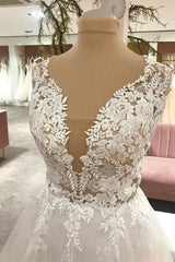 Lange a-line lieverd tule trouwjurk met appliques kant