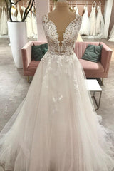 Lange a-line lieverd tule trouwjurk met appliques kant