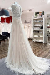 Bescheiden lange A-Line halter tule kant backless trouwjurken