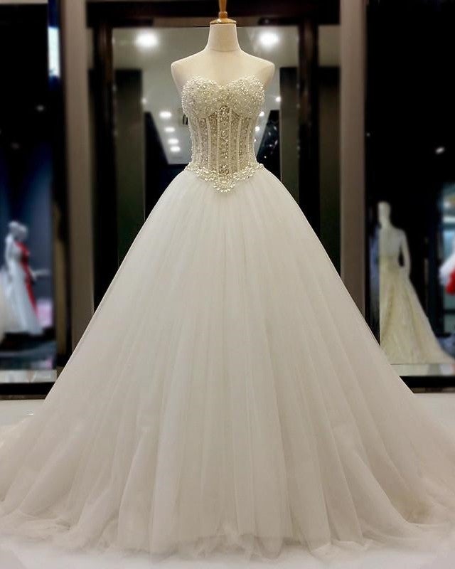 pearl beaded sweetheart see through princess wedding dresses