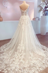 Romantische lange A-lijn spaghetti riemen appliques kant backless trouwjurk