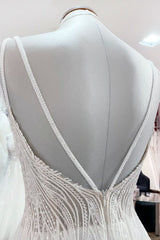 Eenvoudige lange v-hals pailletten versterken A-lijn tule backless trouwjurk