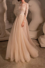 A-line illusion neckline lace embroidery long sleeved bohemian style wedding dress
