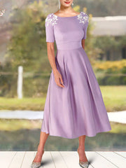 A-Line Mother of the Bride Dress Elegant Sweet Jewel Neck Tea Length Charmeuse Short Sleeve with Appliques