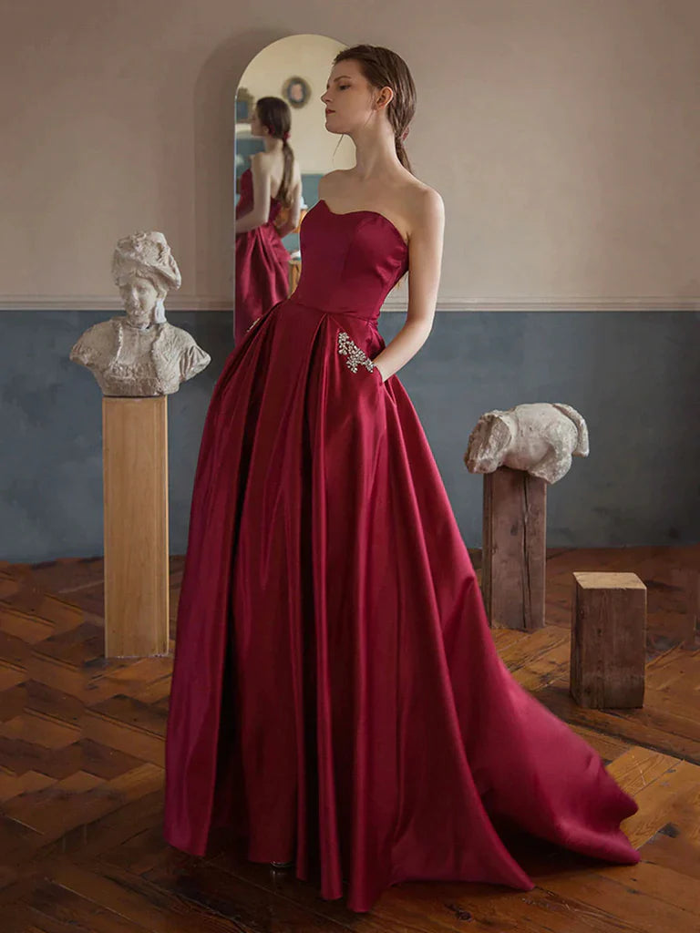Strapless Beads Wine Red Pocktes A Line Satin Prom Dress