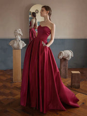 Strapless Beads Wine Red Pocktes A Line Satin Prom Dress