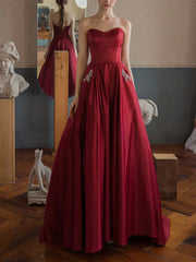 Strapless Beads Wine Red Pocktes A Line Satin Prom Dress